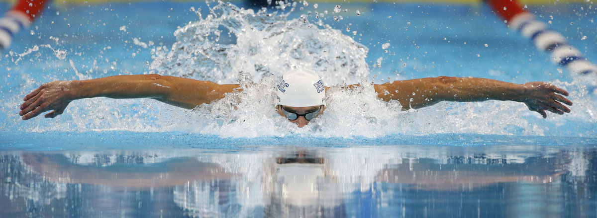 Michael Phelps swims to victory in the men's 100-meter butterfly final at the U.S. Olympic swimming trials, Sunday, July 1, 2012, in Omaha, Neb. (AP Photo/Mark Humphrey)